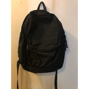 black backpack with front pocket